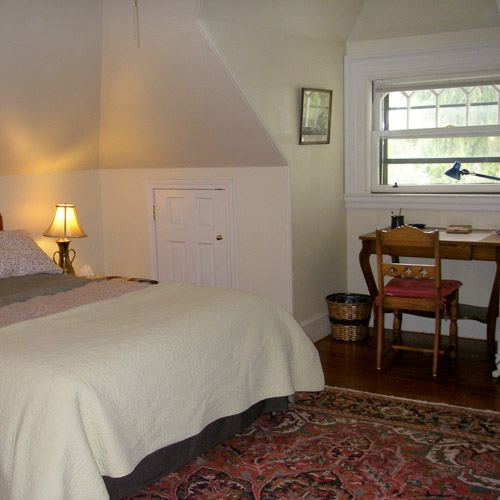 room with bed and desk