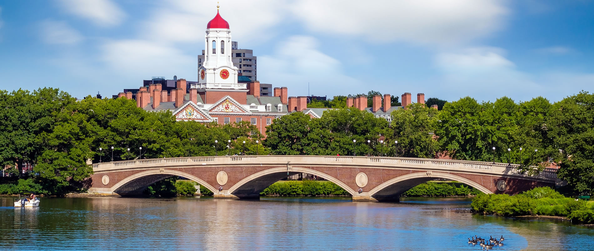 John W. Weeks Bridge with clock tower over Charles River in Harvard University campus Boston