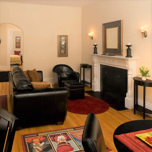 boston furnished apartment couch, table and fireplace